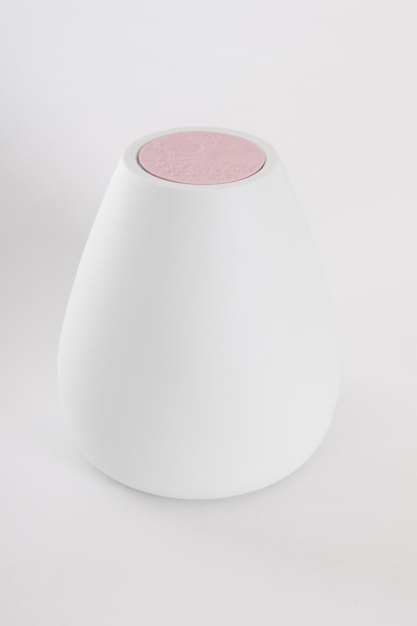 urne funéraire blanche avec un dessus couleur rose poudré
